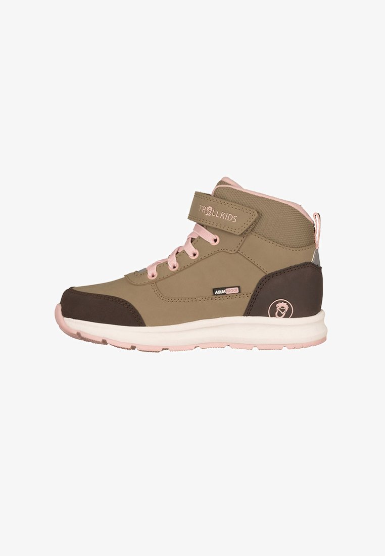 Olive green mid-top shoe with pink accents, Velcro strap and laces, brown rubber toe cap, and white sole. Suitable for outdoor wear.