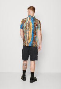 Carlo Colucci UNISEX - Polokošeľa - petrol/yellow/green/offwhite