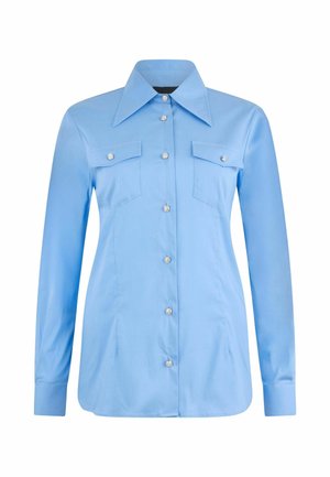 Camicia azzurro chiaro a maniche lunghe con un ampio colletto, due tasche sul petto e bottoni decorativi. Tessuto liscio con una silhouette aderente.