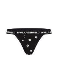 Svart stringtrosor med en vit logobrand och spridda monokroma grafiska mönster. Tillverkade av mjukt, stretchy tyg.
