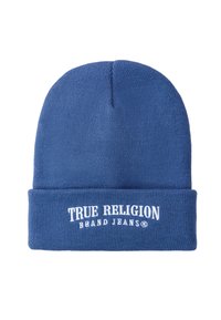 Blauwe gebreide muts met omgeslagen rand, met witte geborduurde tekst "TRUE RELIGION BRAND JEANS®" aan de voorzijde.
