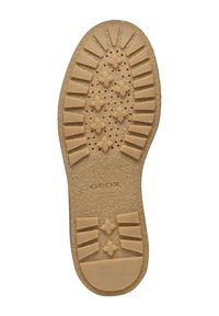 GEOX-skosula, beige gummi med texturerad yta. Har cirkulära perforeringar och ett mönster med framträdande räfflor och korsande linjer.