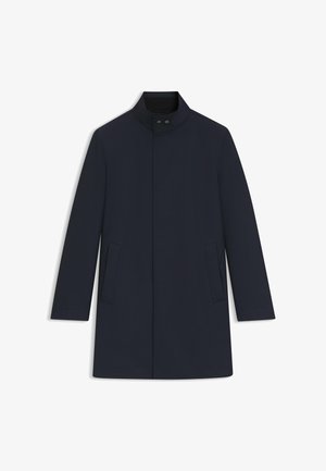 Tummansinisellä takilla on korkea kaulus, etunappikiinnitys ja kaksi sivutaskua. Sujuva kangas, jossa on suora ja muotoiltu malli.