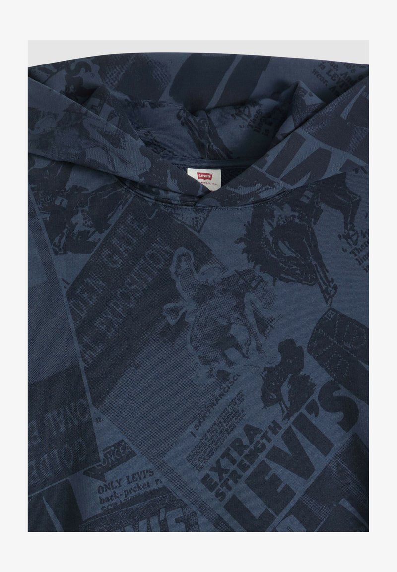 Dark blue Levi's hoodie with printed vintage-style text and images, including a rider on horseback and various promotional phrases.