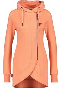 Veste à capuche zippée couleur pêche avec un design enroulé, poches kangourou et une capuche texturée. Possède des cordons de serrage et un petit logo en forme de cœur.