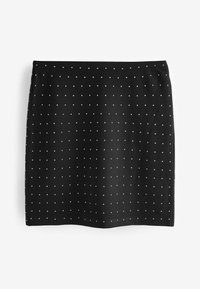 Jupe noire avec un design ajusté, fabriquée en tissu extensible, ornée d'un motif de pois blancs régulièrement espacés sur toute sa surface.