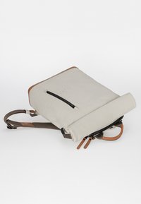 Gray fabric backpack with brown leather accents, roll-top closure, adjustable straps, and a front zippered pocket.