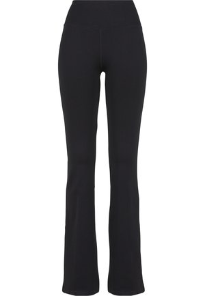 Pantaloni da yoga neri, a vita alta, con gambe a zampa e una larga fascia rigata pensata per comfort ed elasticità.