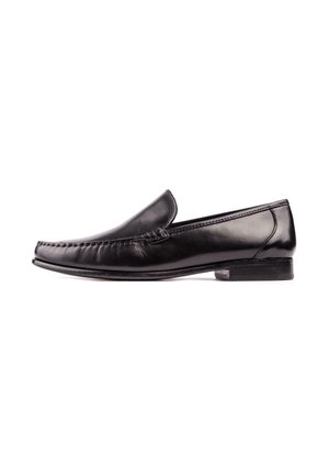 Black leather men's slip-on loafer with stitching around toe area and low stacked heel, shown in side profile on white background.