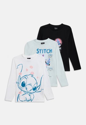 Trzy dziecięce koszulki z długim rękawem z postacią Stitche'a z Disneya Lilo & Stitch w kolorze białym, jasnoniebieskim i czarnym, z różnymi wzorami graficznymi.