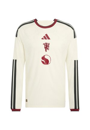 Langärmeliges weißes Sporttrikot mit schwarzen Streifen an den Ärmeln, rotem Kragen und Manschetten sowie drei roten Logos vorne in der Mitte.
