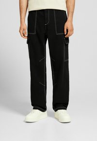 Bershka Tygbyxor - black