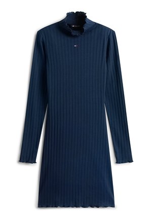 Robe bleu marine côtelée avec manches longues, col haut à volants et bords d'ourlet festonnés. Présente un petit logo sur la poitrine. Texture lisse.