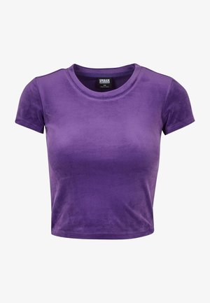 Camiseta corta morada de material suave, con escote redondo y mangas cortas. Textura lisa sin patrones ni acentos visibles.