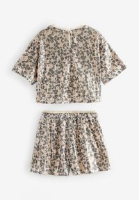Sæt med sequin-top og shorts i beige med sort leopardmønster, cropped korte ærmer, elastisk talje og knaplukning bagpå.