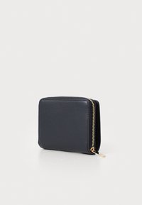 Navy leather wallet with a smooth texture, rectangular shape, and a gold zipper along the edge, featuring a minimalist design.