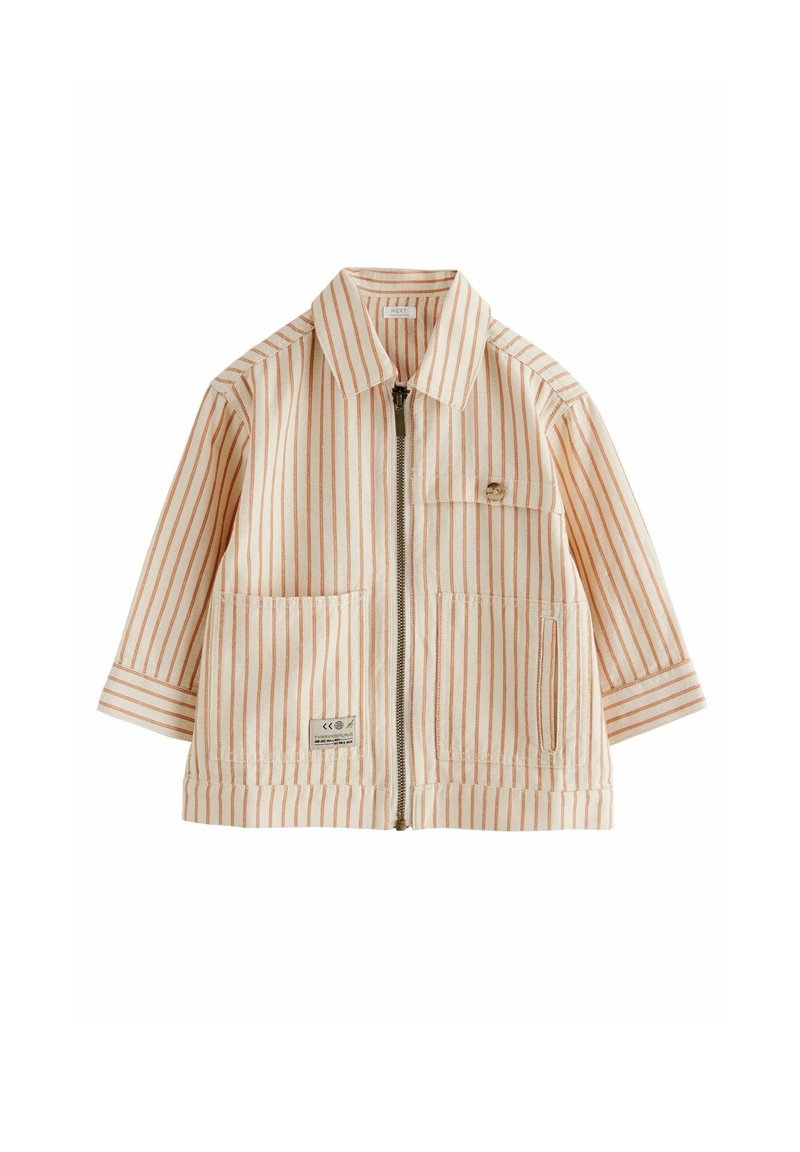 Striped jacket in light orange and white. Features a zip front, collar, two front pockets, and a small logo on the chest pocket. Cotton material.