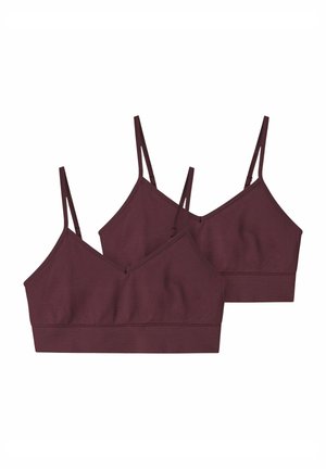 Deux hauts bralette bordeaux avec fines bretelles réglables et une large bande sous la poitrine, présentés sur un fond blanc.