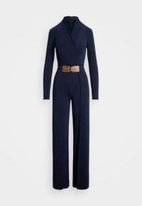 Navy jumpsuit with long sleeves, wrap design, and a belted waist. Made of smooth fabric; features a high neckline and wide legs.