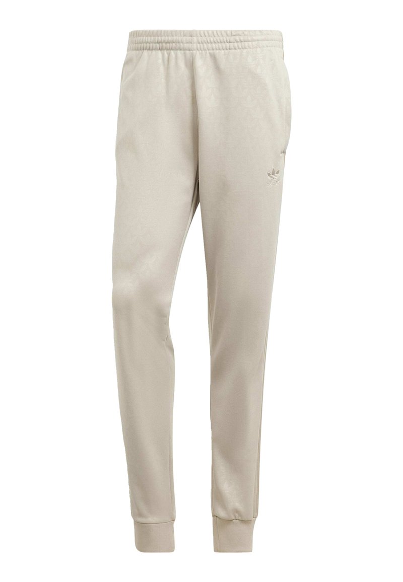 adidas Originals GRAPHICS MONOGRAM SST - Pantalones deportivos - beige ...