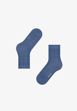 Chaussettes en coton bleu, présentant un motif à carreaux subtil, de longueur mi-mollet et d'une texture lisse. Nom de la marque "FALKE" imprimé en couleur claire.