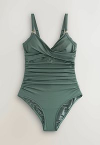 Žalias vientisas maudymosi kostiumėlis su reguliuojamomis petnešėlėmis, su raukšlėmis vidurio dalyje ir įvyniojimo stiliaus V formos iškirpte ant vientisos fono.