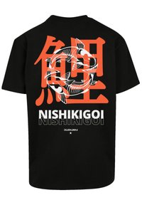 Black t-shirt featuring koi fish graphic in orange and white, with Japanese characters and "NISHIKIGOI" in bold text. Cotton fabric.