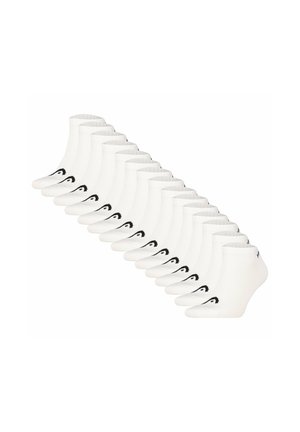 Fourteen pairs of white ankle socks with a black logo on the side arranged in a diagonal line on a white background.