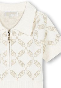 White knit short-sleeve top with collar, front zipper featuring MK logo, and beige interlocking chain pattern with MK initials.