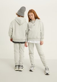 Yourturn Kids UNISEX - Tepláky - mottled light grey