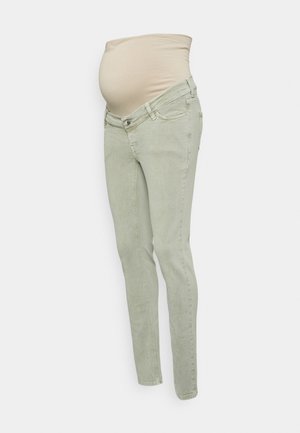 Jeans de maternidade verde claro com um cós elástico bege, design justo e estilo clássico de cinco bolsos. Apresenta fecho frontal com botão.