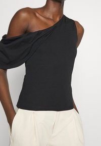 Iro Triko s potiskem - black