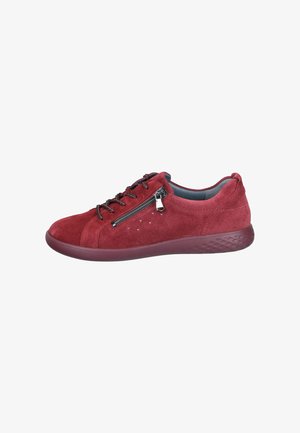 Suede red sneakers with a rounded toe, black laces, side zipper, and perforated detailing on the upper. Rubber sole features textured patterns.