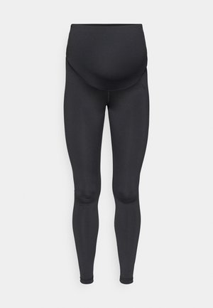 Leggings de maternidad negros con una pretina alta y de soporte. Hechos de tela elástica y suave con un diseño de longitud completa y costuras mínimas.