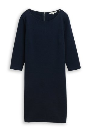 Marineblaues, knielanges Kleid mit dreiviertellangen Ärmeln, rundem Ausschnitt und Reißverschluss hinten. Texturiertes Stoff mit dezenten horizontalen Rillen.