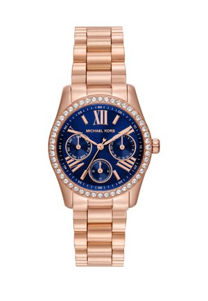 Orologio Michael Kors con bracciale in oro rosa, quadrante blu navy, indici delle ore in numeri romani, tre sottodial e una lunetta decorata con cristalli.