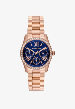Orologio Michael Kors con bracciale in oro rosa, quadrante blu navy, indici delle ore in numeri romani, tre sottodial e una lunetta decorata con cristalli.