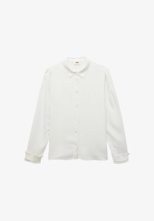Camisa blanca de manga larga con cuello abotonado, botones en el frente y puños con volantes. Hecha de una tela suave con un corte entallado.