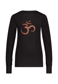 Svart långärmad t-shirt i bomull med en kopparfärgad Om-symbol tryckt på framsidan. Mjukt material, rundad hals.