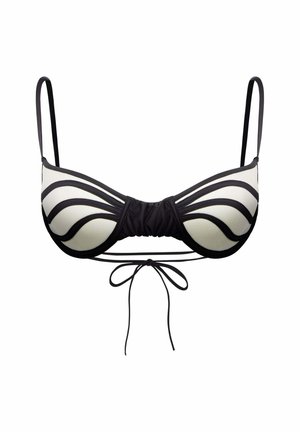 Top bikini bianco e nero con design a righe, supporto con ferretto, spalline regolabili e chiusura anteriore con nodo. Texture del tessuto liscia.