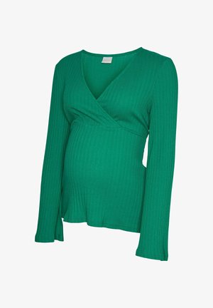 Roheline soonikkootud rasedustopp pikkade varrukatega ja V-kaelusega mähisdisainiga.