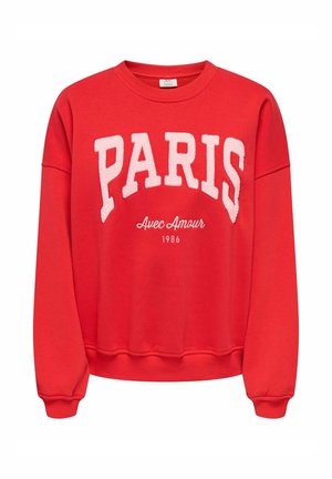 Sweat-shirt rouge à col rond avec un grand texte blanc "PARIS", des textes plus petits en cursive "Avec Amour," et "1986" imprimés en dessous sur le devant.