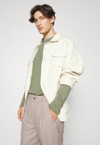 DRYKORN CHASY - Kalhoty - brown