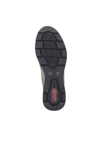 Semelle de chaussure en caoutchouc noir avec un motif texturé et des rainures pour une meilleure adhérence. Comprend un logo rond et un indicateur de taille sur la surface.