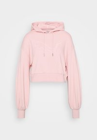 Sudadera corta rosa hecha de un tejido suave, con un gran logo blanco de Puma, capucha con cordones y mangas anchas con puños acanalados.