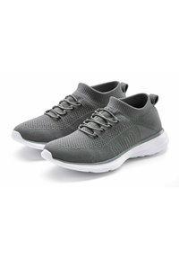 Gray knit athletic shoes feature a sock-like collar, elastic laces, and a white rubber sole with textured accents.