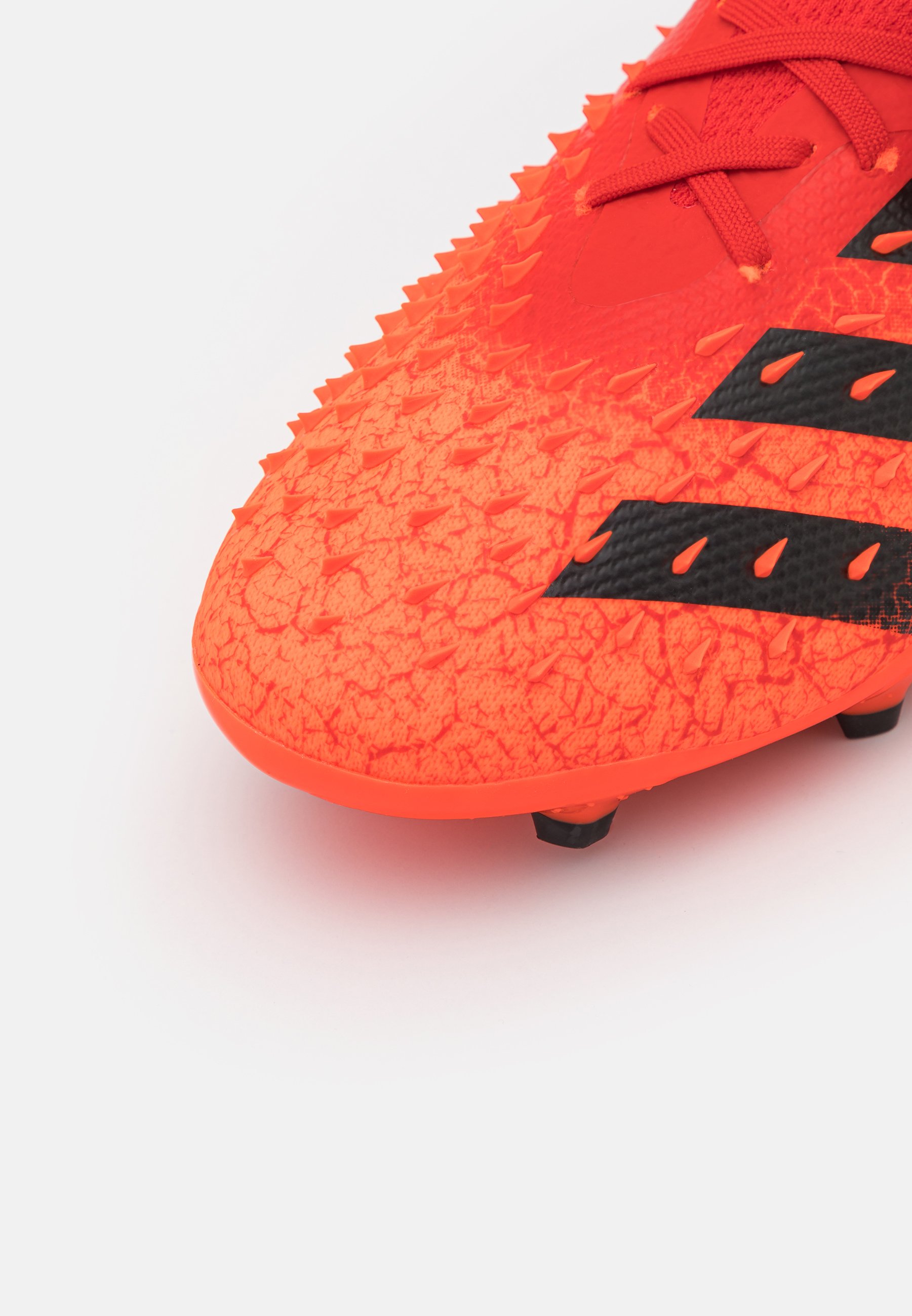 red predator football boots