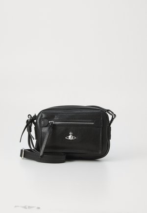 Black leather crossbody bag with front zip pocket, silver logo emblem, and adjustable strap on white background.