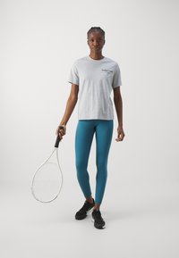Björn Borg STUDIO CROSS - Leggings - mallard blue