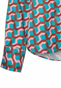 Camicia a maniche corte con un motivo geometrico in turchese, rosa e marrone. Tessuto liscio con polsini bottonati e orlo arrotondato.